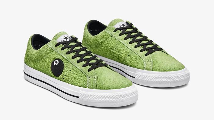 Best Converse collabs - Stüssy x Converse One Star Low "8-Ball" product image of a pair of green low-tops with a black pool 8-Ball on the side.