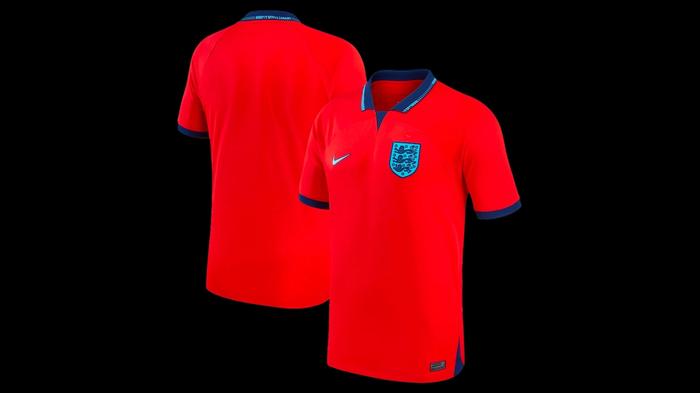 Best World Cup kits - England Nike home kit product image of a red shirt with a blue collar and logo.