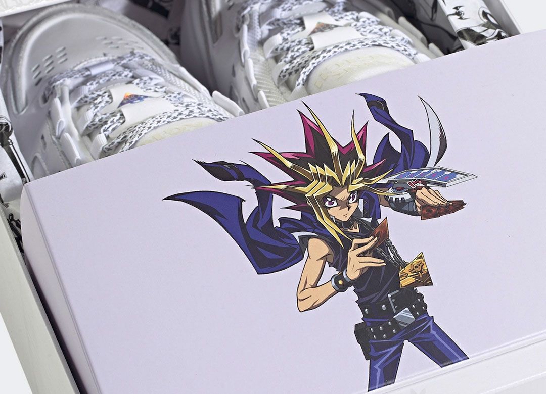Yu-Gi-Oh! x adidas ADI2000 product image of a custom white box with a graphic of Yugi on the front.