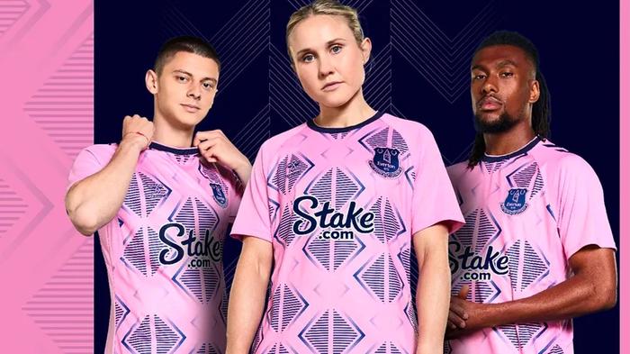Everton Hummel home kit product image of a pink and dark blue shirt.