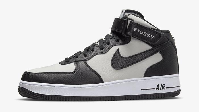 Best Air Force 1 Stüssy Mid "Light Black Bone" product image of a mid-top black and grey sneaker.