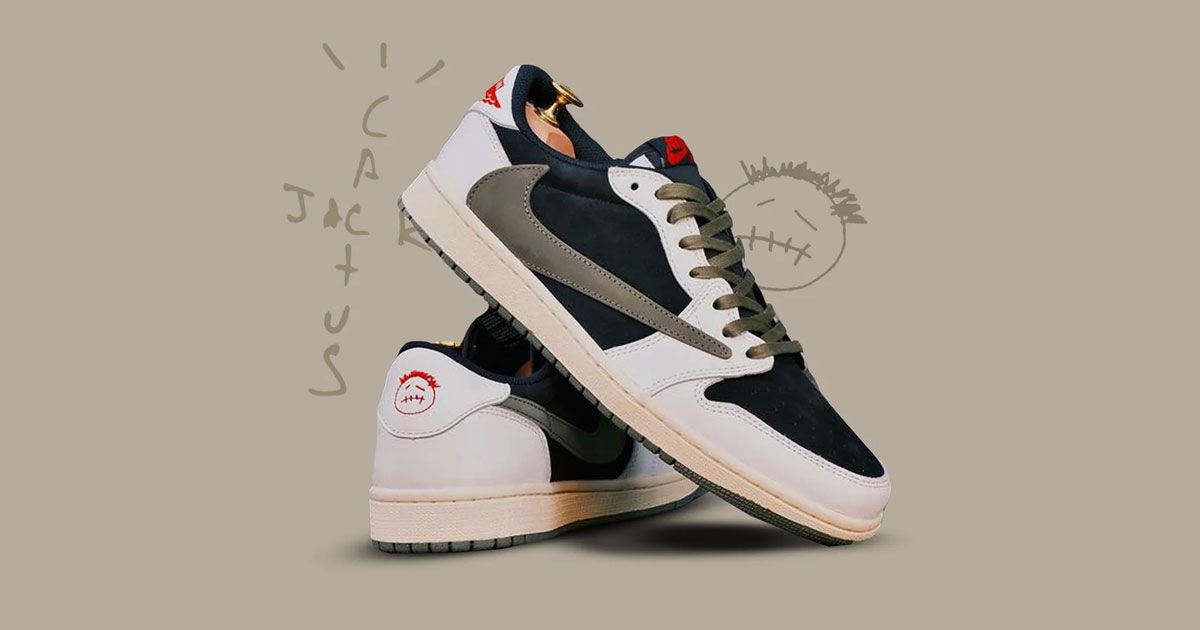 A sail, black, and olive pair of Jordan 1 Lows featuring red accents leaning against each other in front of a brown background featuring Travis Scott's Cactus Jack logo.