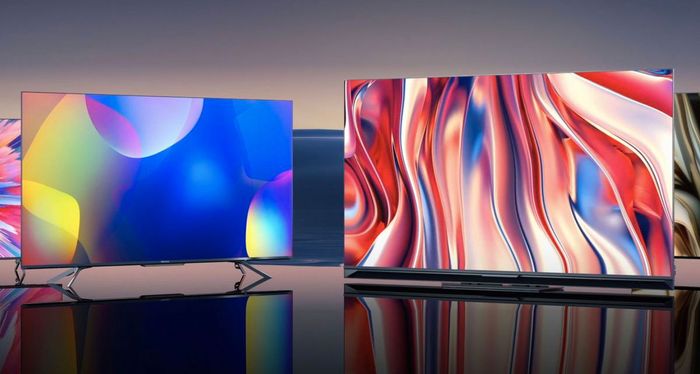 Latest TV news Hisense product image of two flat-screen TV with abstract, multi-coloured patterns on the displays.