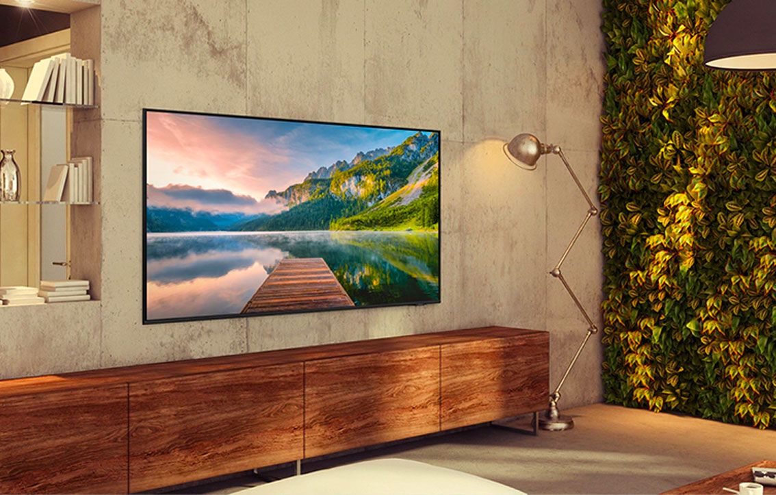 Samsung product image of a 43" TV with a country lake still on the display.