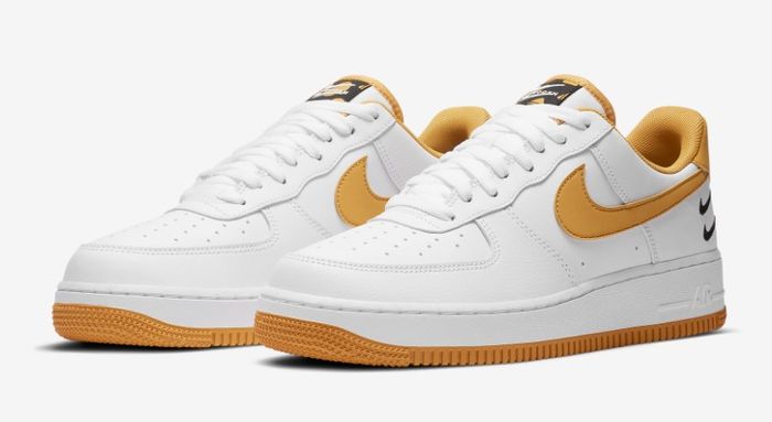 Nike Air Force 1 Low '07 White Light Ginger product image of a white leather pair of sneakers with ginger accents.