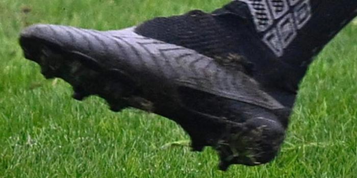 Latest football boot news Nike leaked image of a triple-black boot with mesh covering the laces.