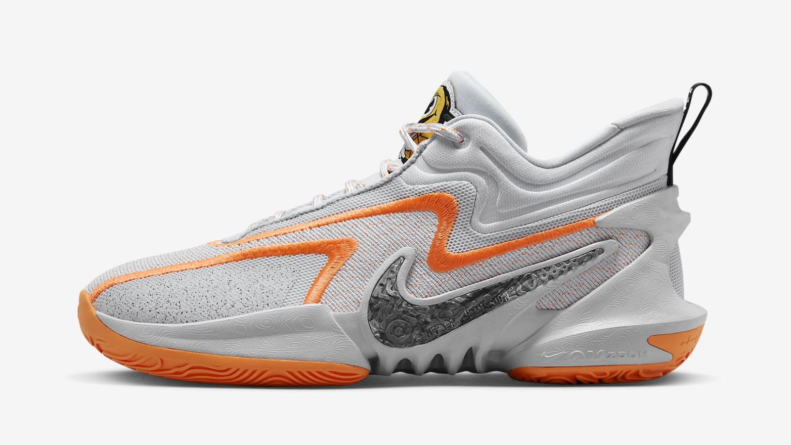 Nike Cosmic Unity 2 product image of a Wolf Grey basketball shoe with orange and black details.