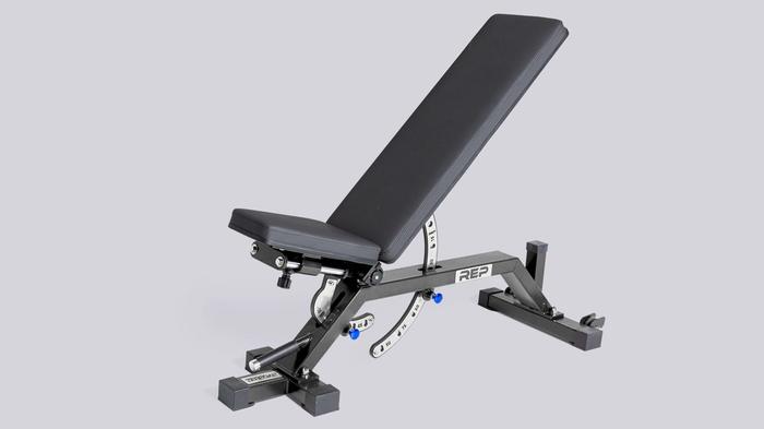 Best weight bench REP Fitness product image of a black leather bench with blue adjusting handles.
