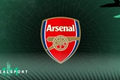 Arsenal badge with green background