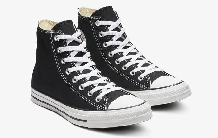 Converse product image of black high-tip Chuck Taylor All Stars with white details and laces.