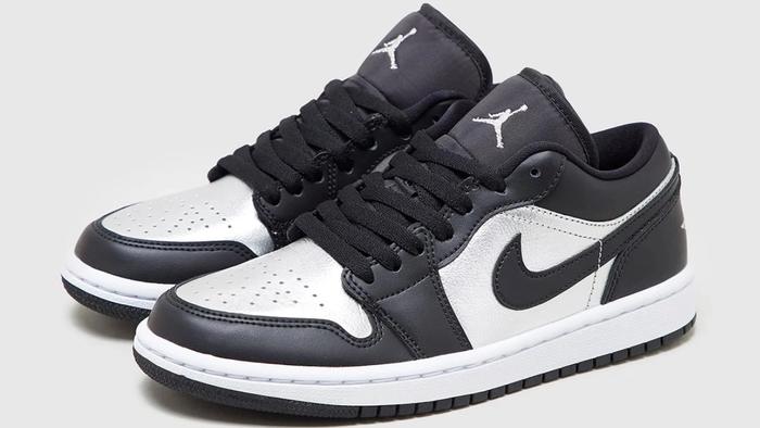 Air Jordan 1 Low "Silver Toe" product image of a pair of black and silver sneakers.
