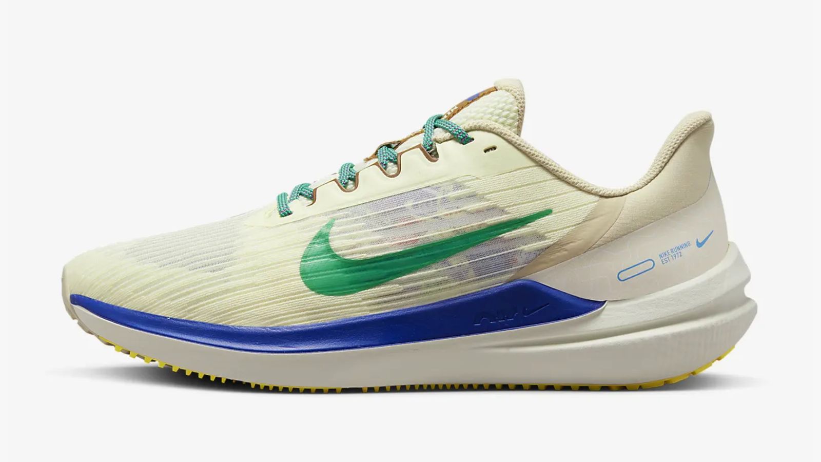 Nike Winflo 9 product image of a coconut milk and light sand running shoe with green and blue details.