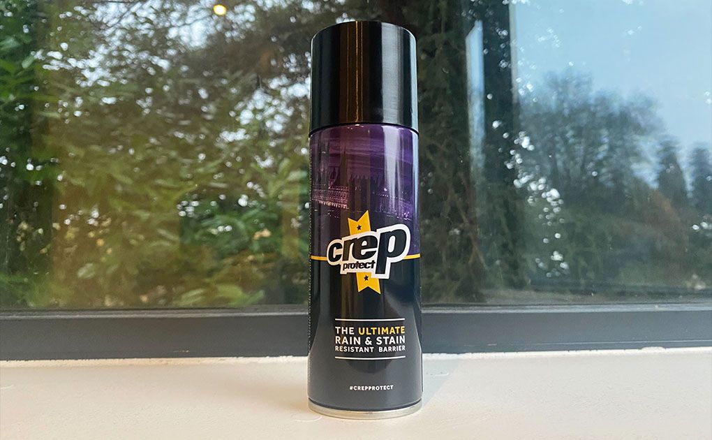 Crep Protect Shoe Protector spray can in black and purple with yellow trim.