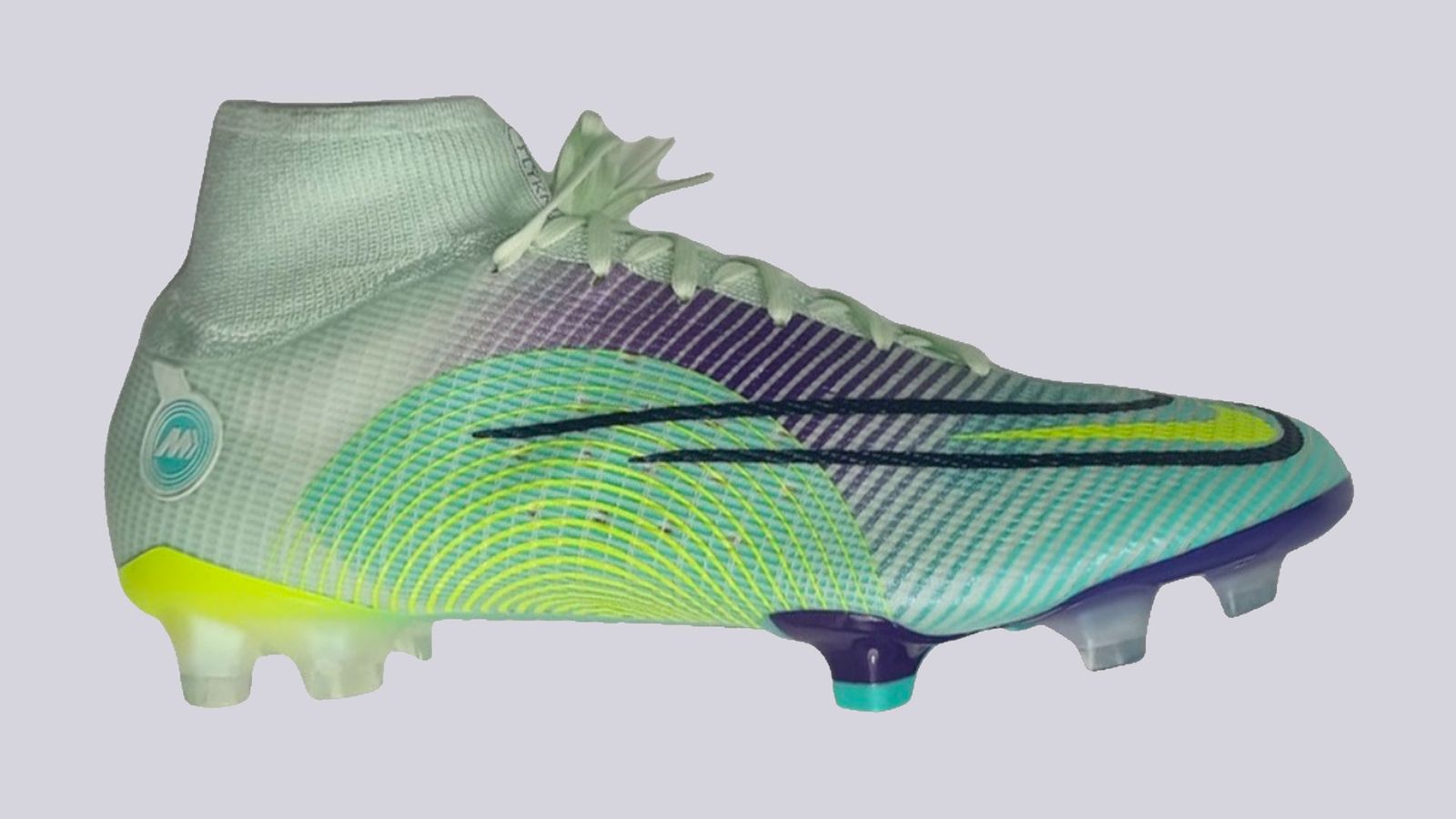 Nike Mercurial Dream Speed 5 product image of a single green, yellow, and purple football boot.