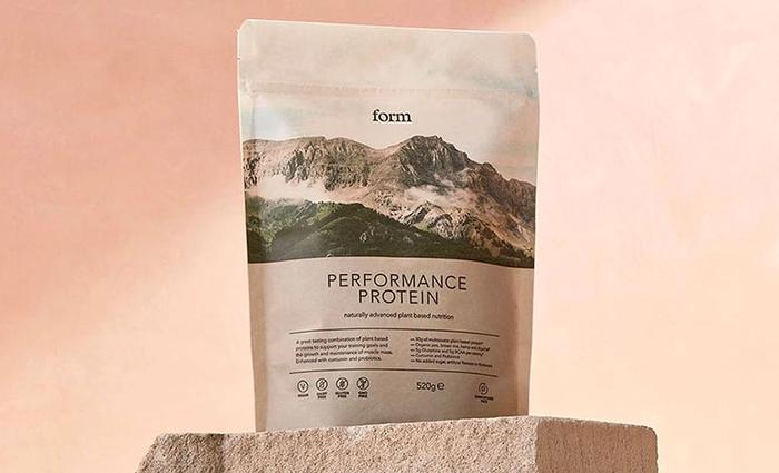 Best vegan protein powder Form product image of white packet featuring a mountain range image on the front.