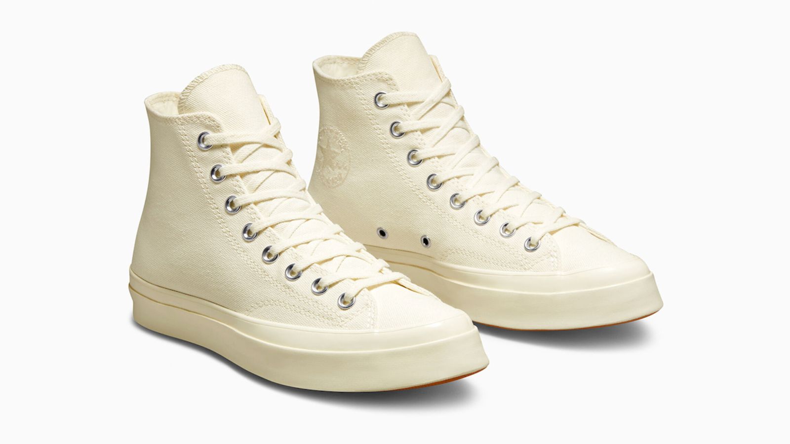 Devin Booker x Converse Chuck 70 Hi "The Next Icon" product image of an all-egret-coloured pair of high-tops.