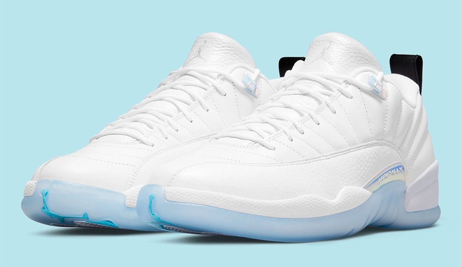 Best Air Jordan 12 colorways "Easter" product image of a pair of white low-top sneakers with icy blue outsoles.