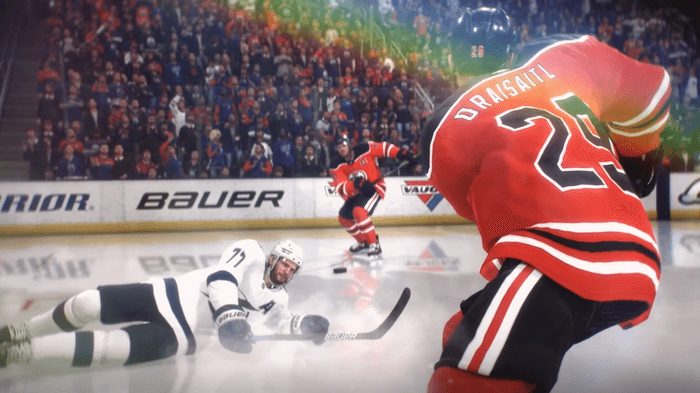 Leon Draisaitl of the Edmonton Oilers sends the puck past an opponent in NHL 22