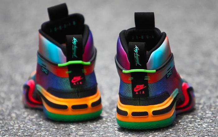 Air Jordan 36 "Year Of The Tiger" product image of a vivid, multi-coloured sneaker with black details.
