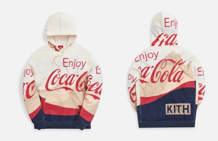 Coca-Cola x KITH Mountains Hoodie product image of a cream white, blue, and red hoodie featuring Coca-Cola branding.
