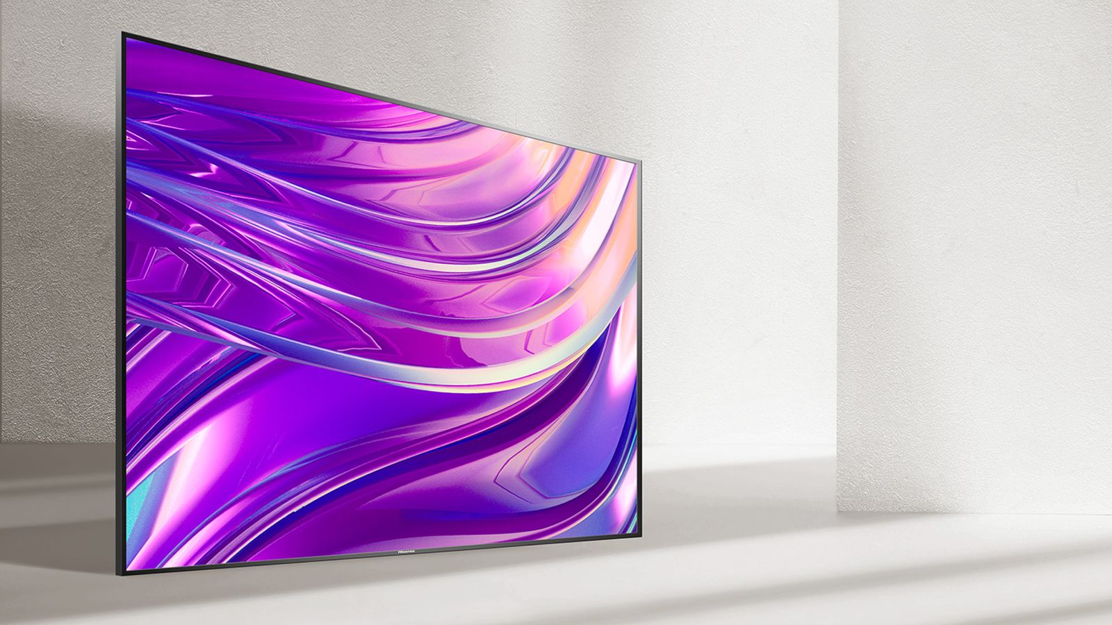 Hisense 55U8H product image of a flatscreen TV in a grey room with a purple flowing pattern on the display.