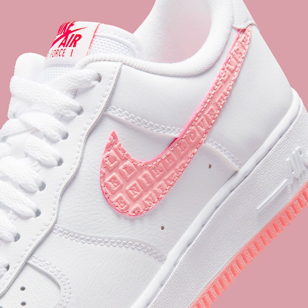 Nike Air Force 1 Valentine's Day product image of white and pink sneakers.