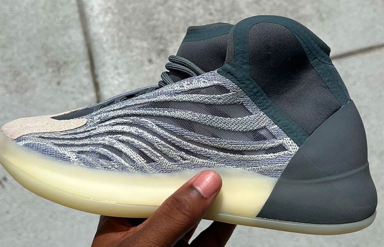 adidas Yeezy QNTM Mono Carbon product image of a grey and black reflective sneaker.