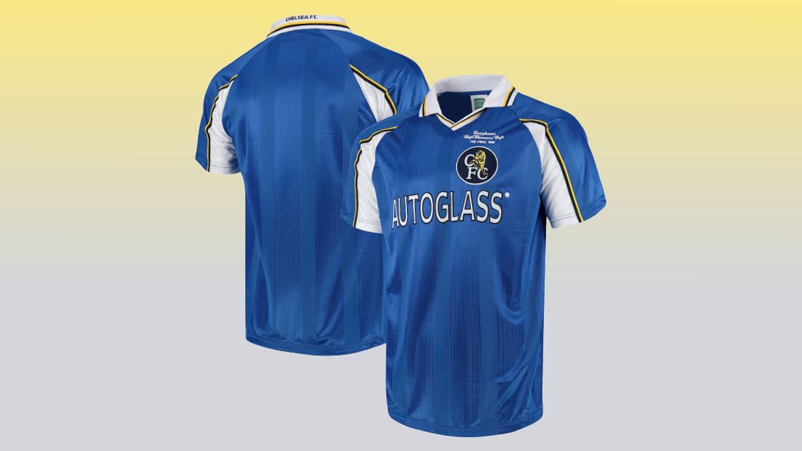 A blue and white collared chelsea kit with yellow trim and AutoGlass as the sponsor across the chest.