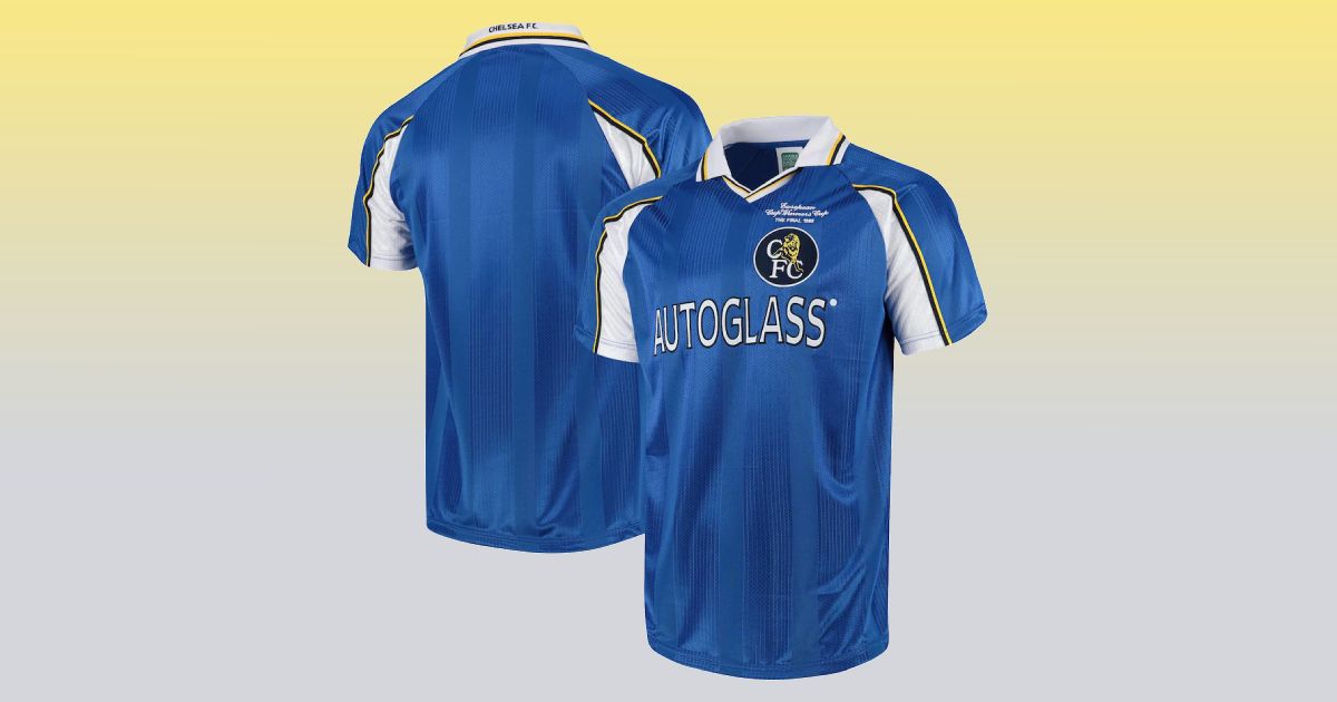 A blue and white collared chelsea kit with yellow trim and AutoGlass as the sponsor across the chest.