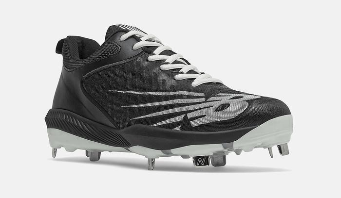 Best baseball cleats New Balance product image of a single black and white cleat.