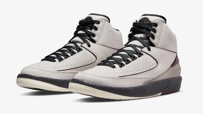 Best Jordan collabs A Ma Maniére x Air Jordan 2 product image of a sail, black, and burgundy sneaker.