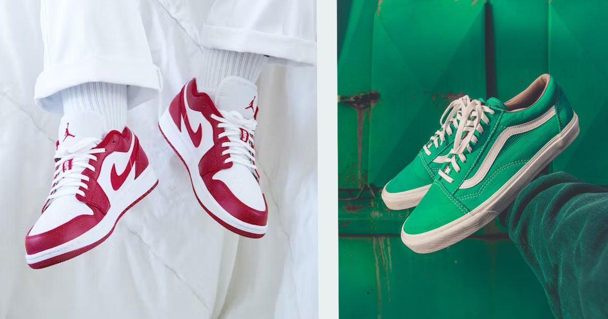 Someone in white trousers and socks wearing a pair of white and red Nike Air Jordan Lows on the left. On the right, someone holding a pair of green Vans featuring white branding and soles.