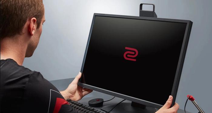 A black monitor with a red BenQ logo on the display.