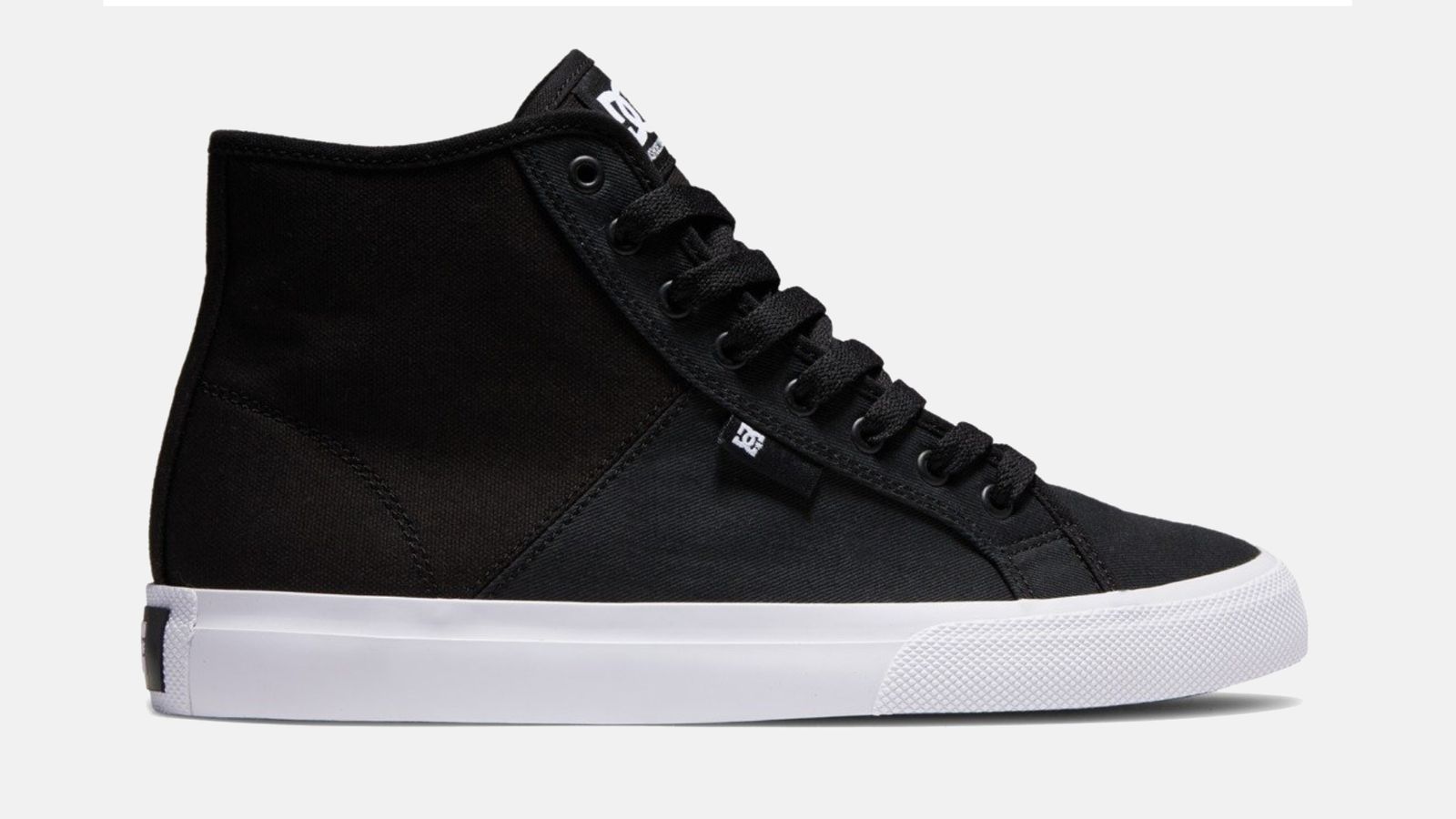 DC Manual Hi Txse product image of a black high-top featuring a white midsole.