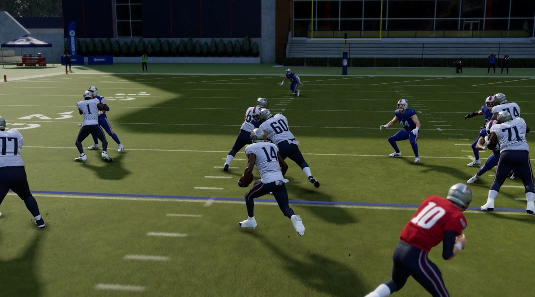 The Patriots running the ball in Madden 24