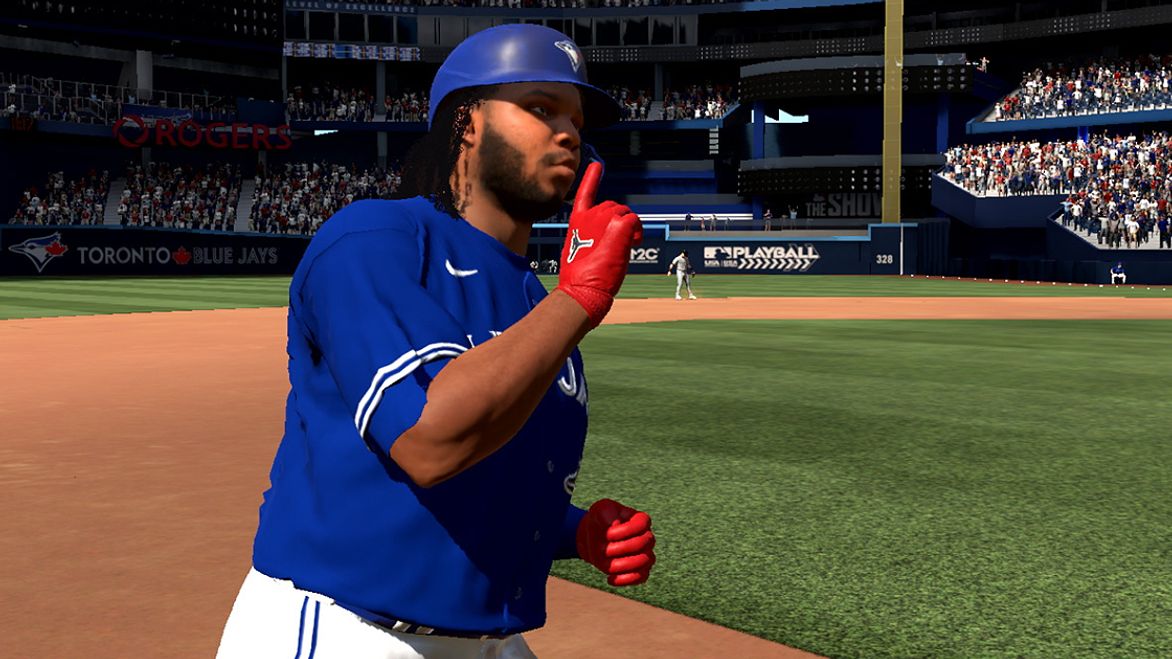 Vladimir Guerrero Jr. in MLB The Shoe 24 in a blue jersey and red gloves.