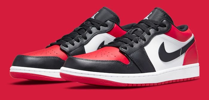 Air Jordan 1 "Bred Toe" product image of a red, white, and black pair of sneakers.