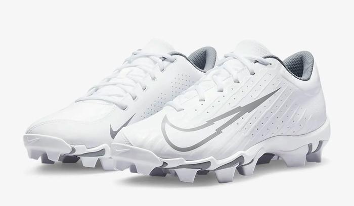 Best baseball cleats Nike product image of a white pair of cleats with silver details.