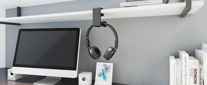 Headset mount hanging on shelf.