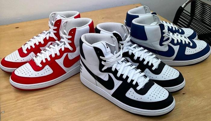 COMME des GARÇONS Homme Plus x Nike Terminator product image of a set of red, blue, and black high-tops.
