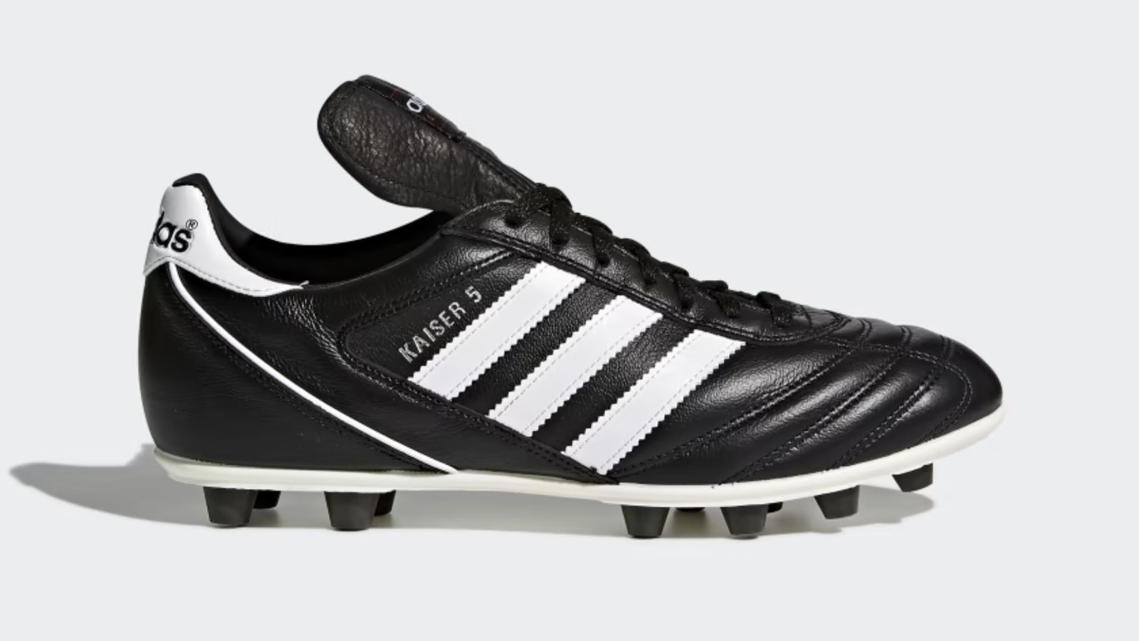 adidas Kaiser 5 Liga product image of a black football boot with white accents, including three white stripes across the side.