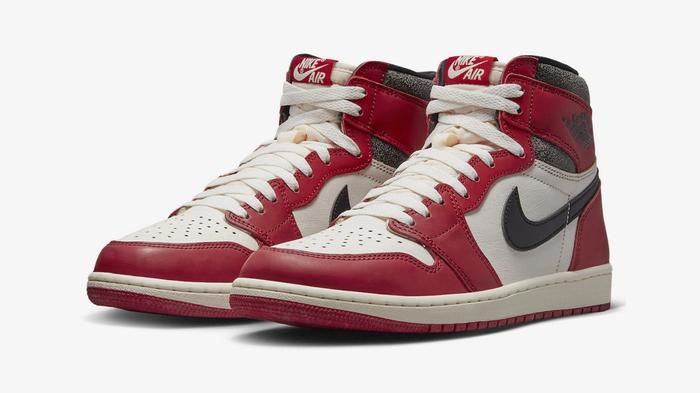 Best Jordan 1 colorway "Lost and Found" product image of a pair of red, white, and black high-tops with pre-aged details.