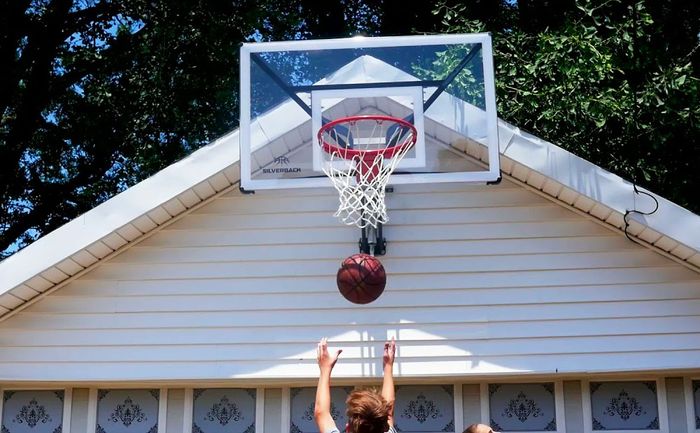 Best basketball hoops Silverback product image a clear backboard, red hoop, and white net.