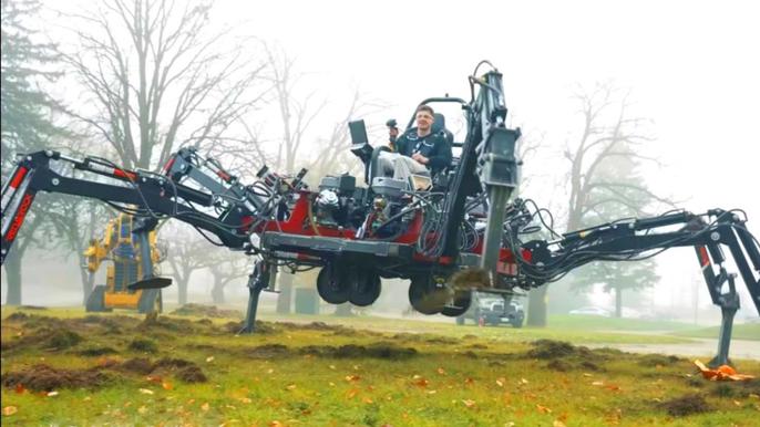 An image of Hacksmith’s huge robot spider roaming outside in foggy weather 