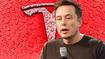 Tesla CEO Elon Musk on a red Tesla car 