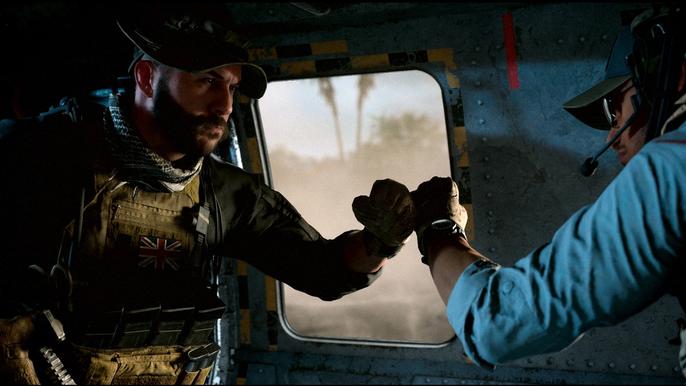 Soldier fist-bumps a pilot inside an aircraft - Modern Warfare 2 Campaign Missing DLC Pack Error