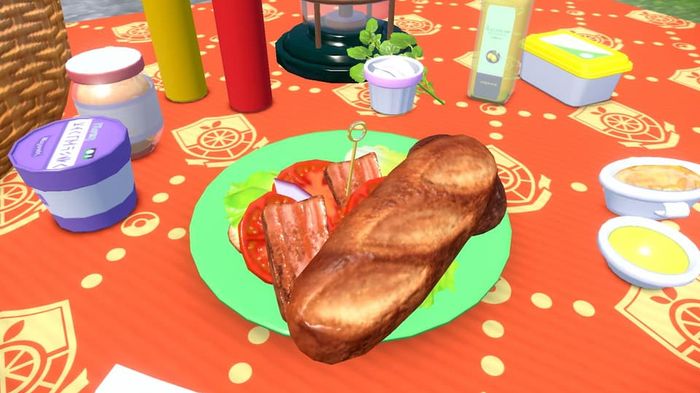how-to-breed-in-pokemon-scarlet-and-violet | A picture of a sandwich served on a table.